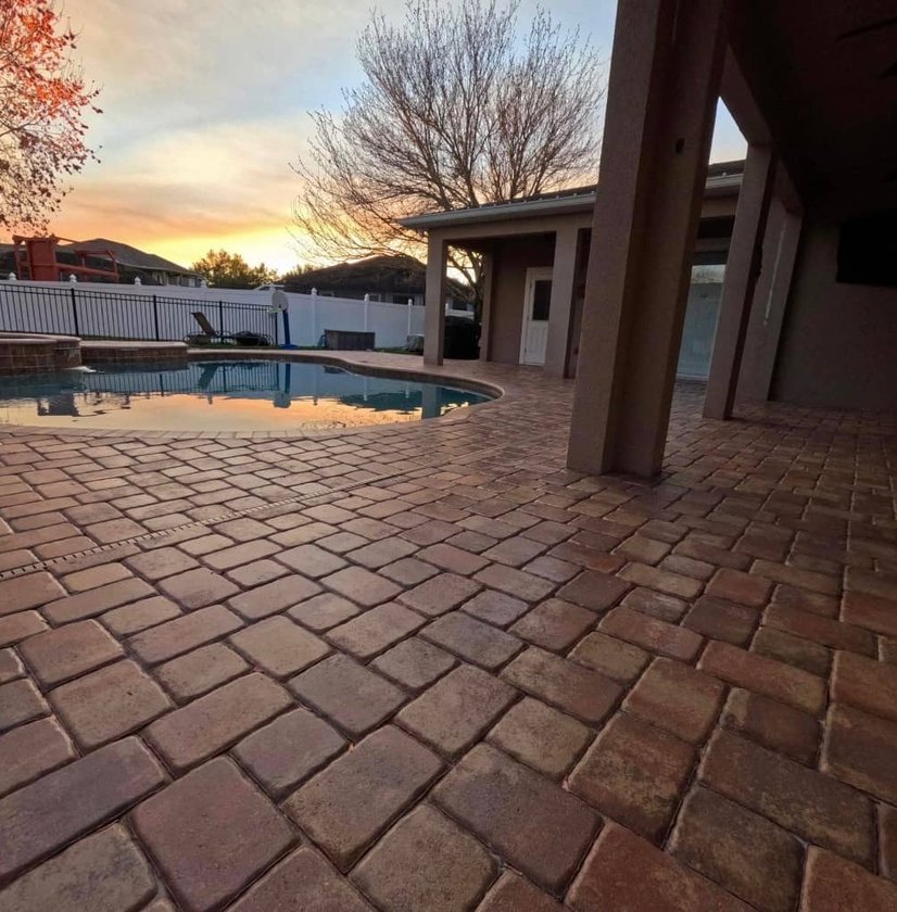 Brick walkway with landscape lighting